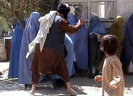 Taliban beating a woman in Kabul