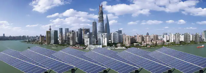 Solar panels in front of the Shanghai skyline, China. 