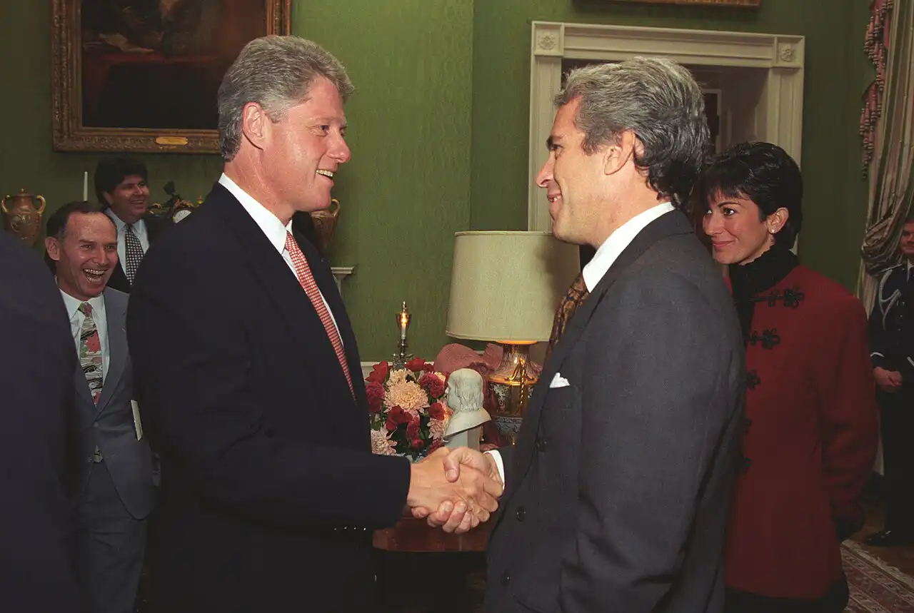 Bill Clinton (left), Jeffrey Epstein and Ghislaine Maxwell (right) in 1993