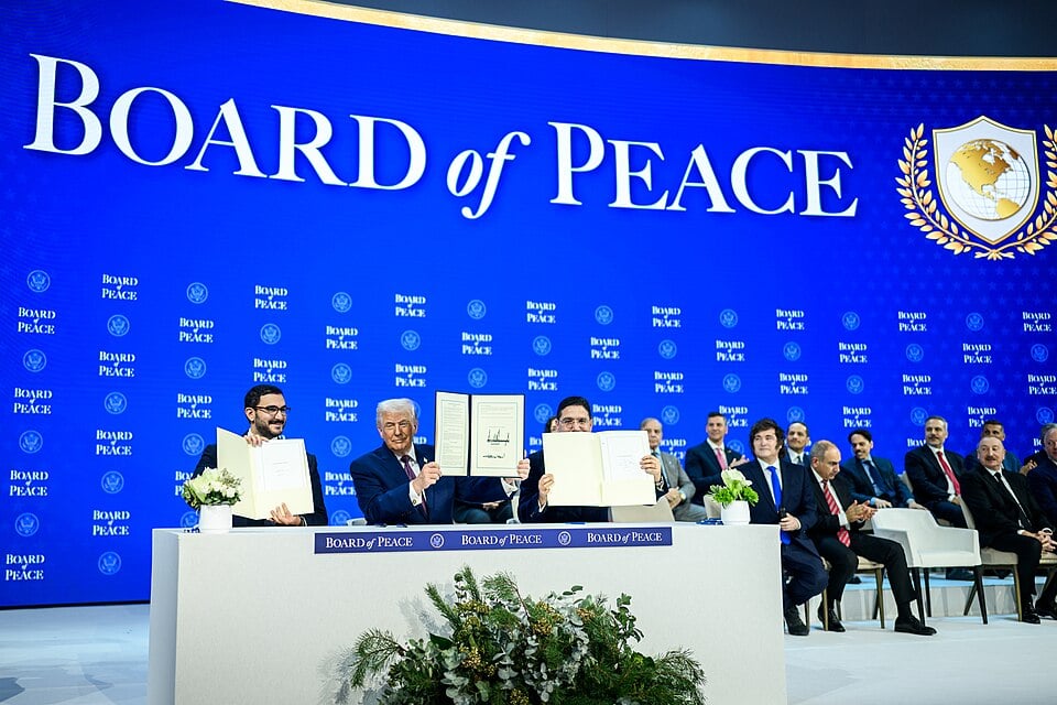 President Donald Trump participates in the Board of Peace Charter Announcement and Signing ceremony during the World Economic Forum, Thursday, January 22, 2026, at the Davos Congress Center in Davos, Switzerland. 